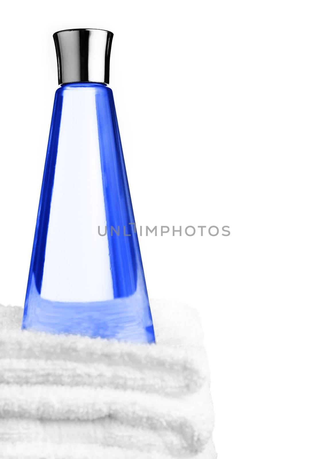 Shampoo and towels against a white background.