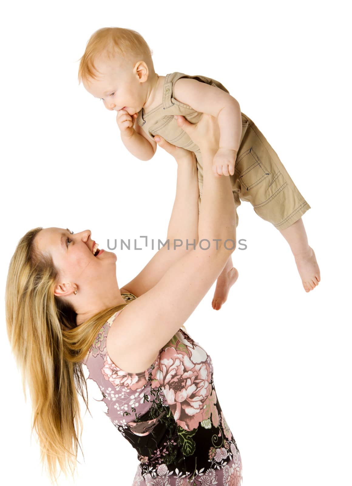 Happy Mother holding toddler son isolated on white