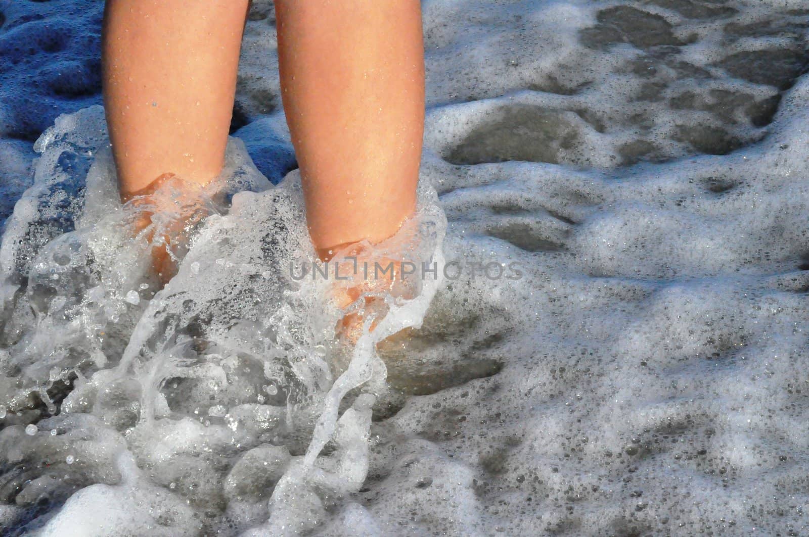 Feet in the sand