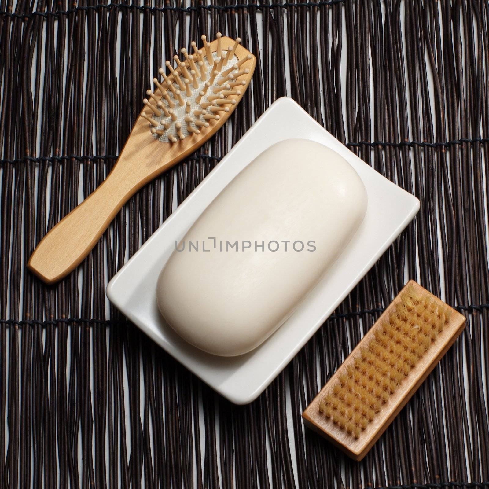 Decorative soap display on a bamboo mat.