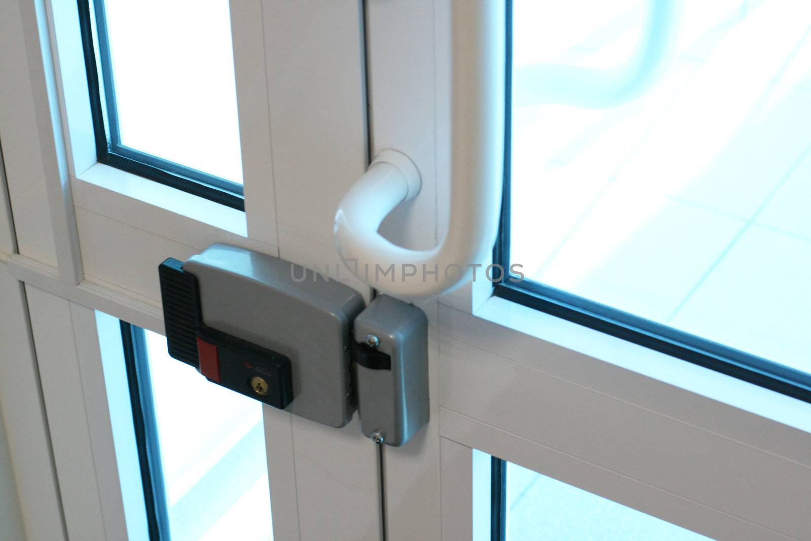 Modern glass door with the electric lock