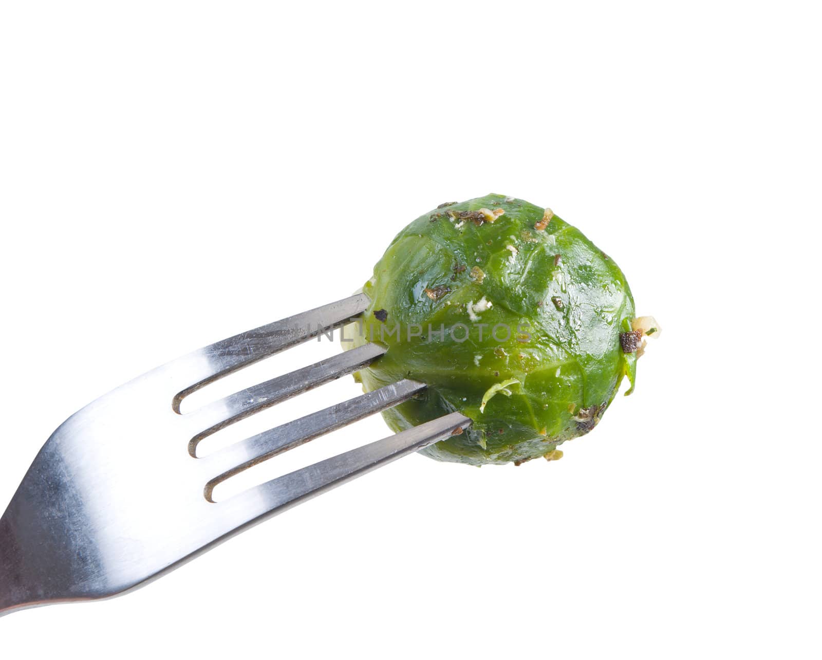 Brussels sprouts on fork.Vegetable dish