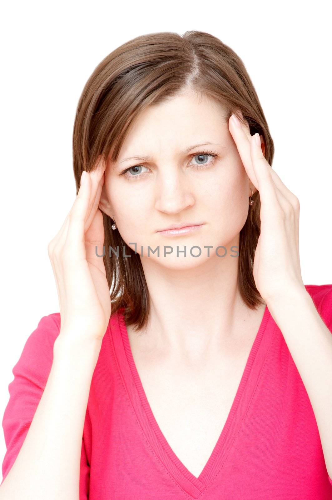 young woman touching her temples with both hands having a headache 