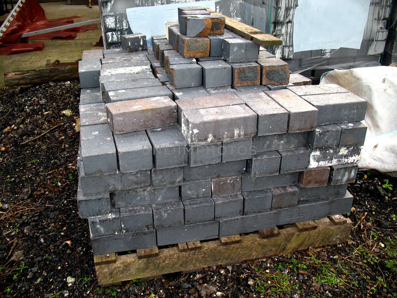 Grey Bricks upon a pallet



