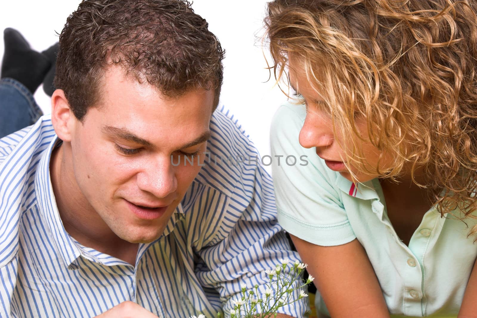 Young girl and boy close together sharing some intimate moments