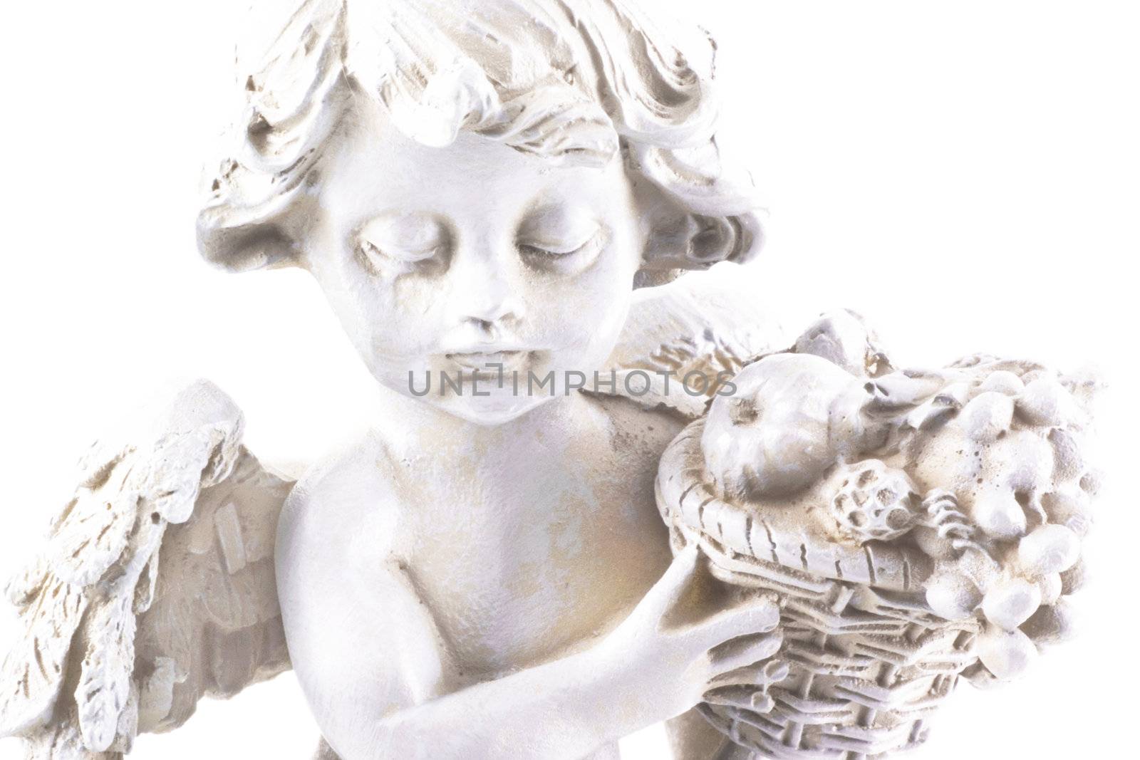 Little angel statue in high key; isolated on a white background.