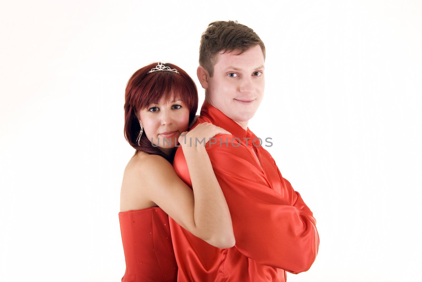 young couple in red  as a concept of love and passion