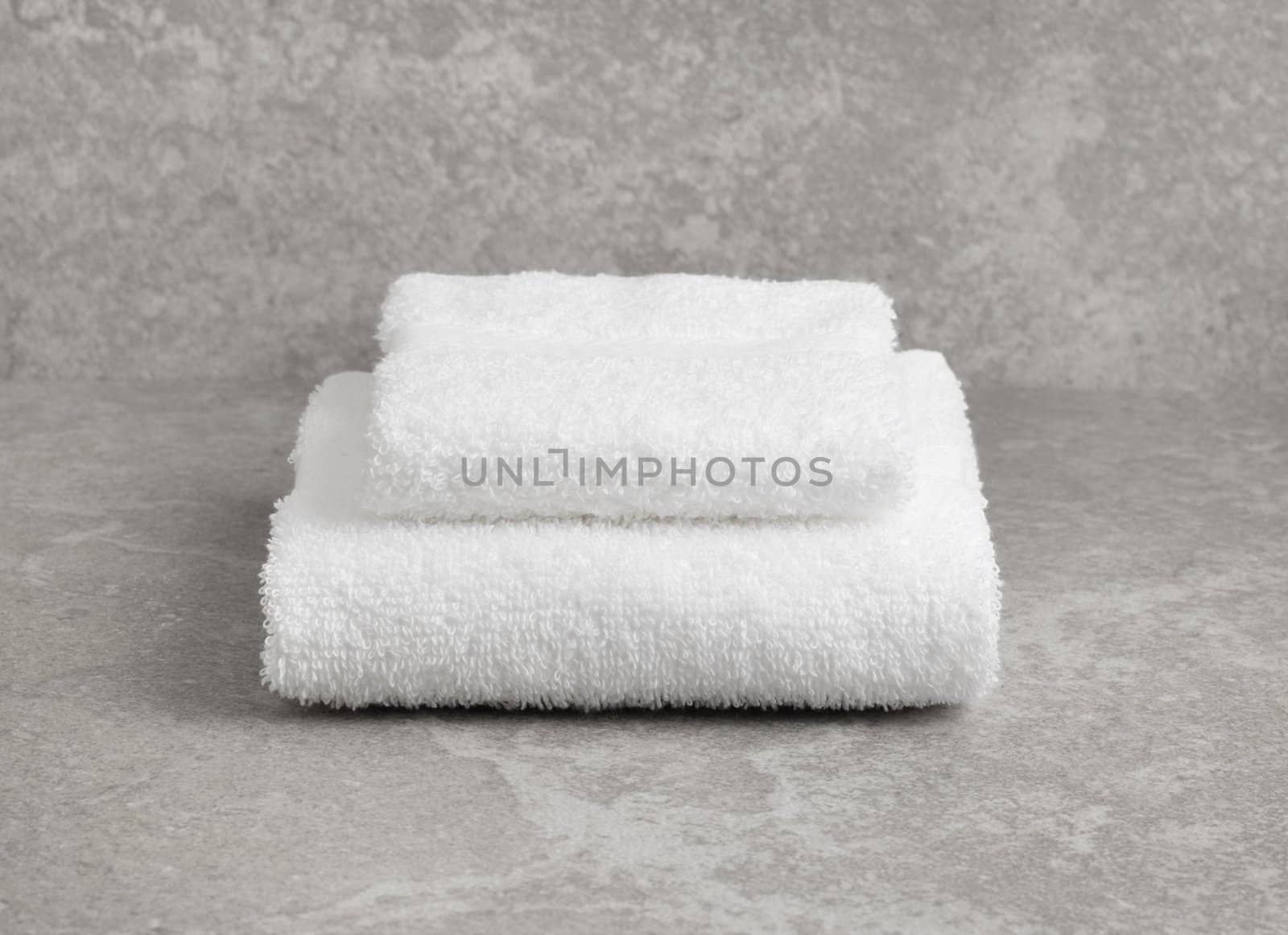 Bathroom object photographed against a granite backdrop.