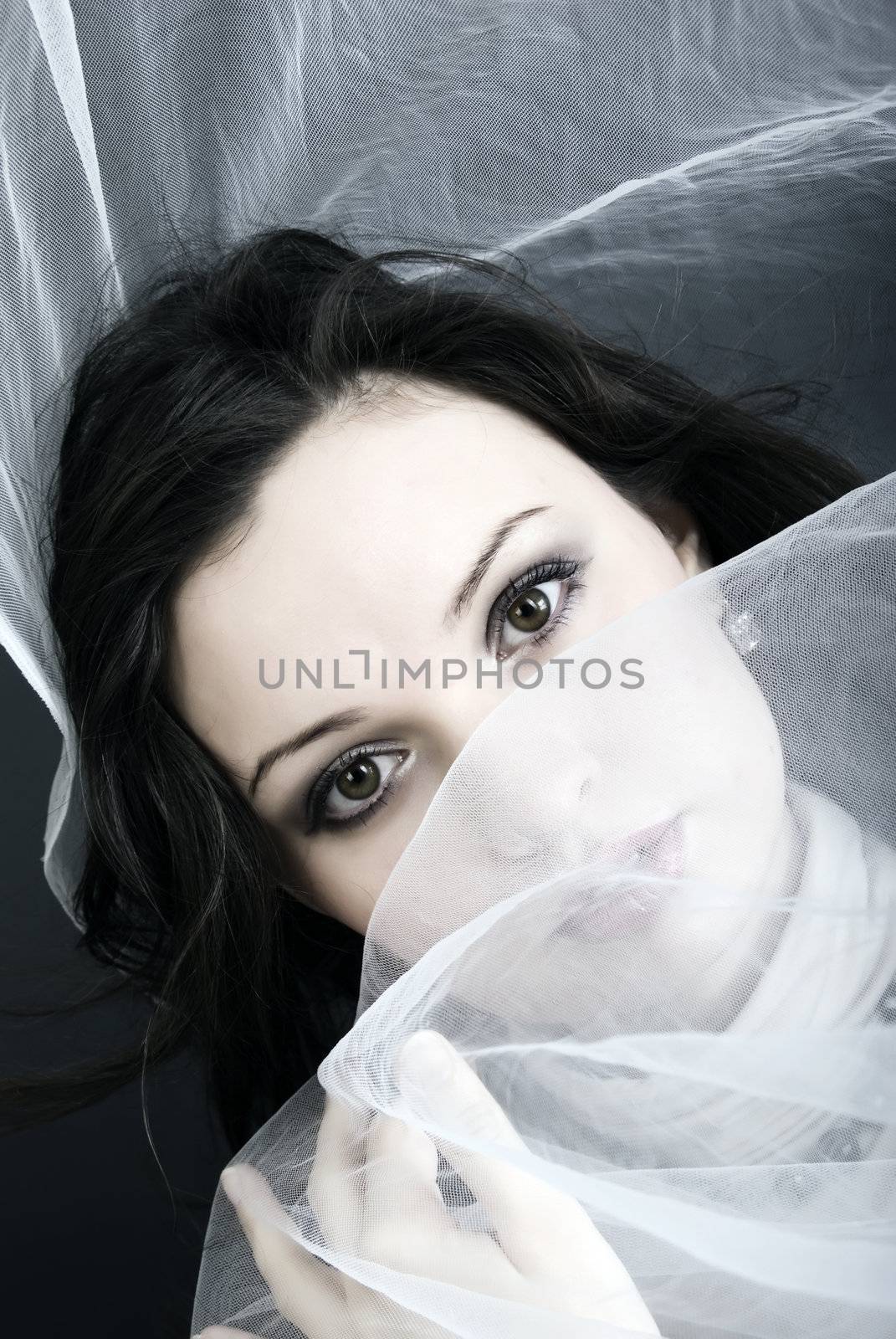  Portrait of a young beautiful brunette - focus on eyes