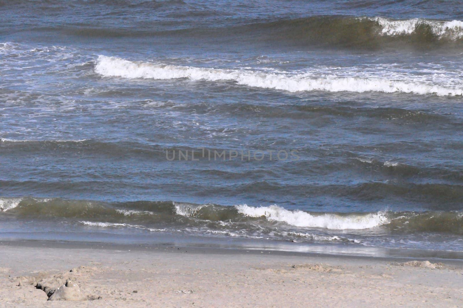 Sand and waves by RefocusPhoto