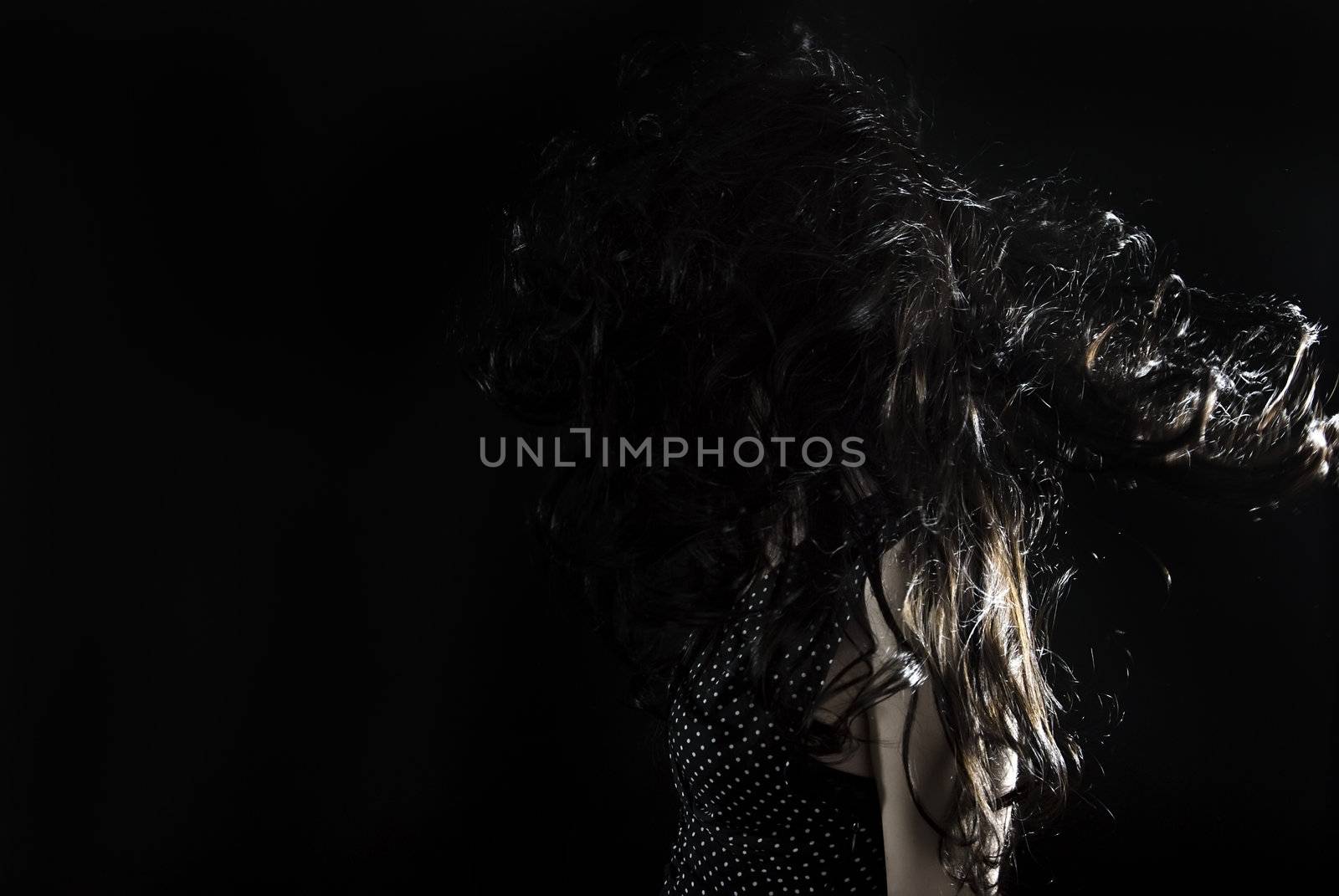 young  brunette with her face hidden with hair