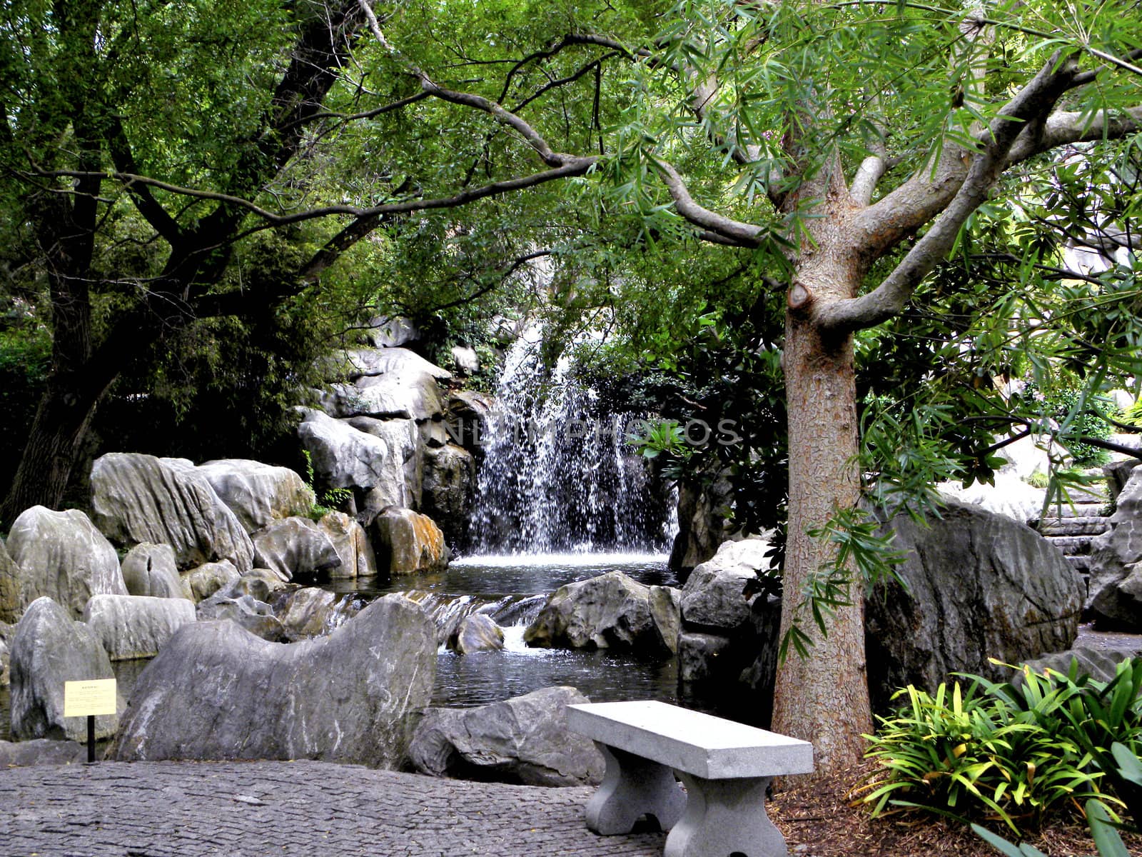 Photo present waterfall. Photo taken in Chinese Garden.