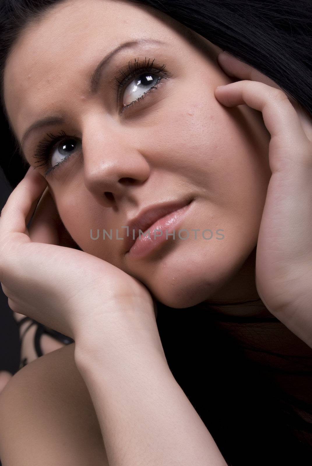 Portrait of a young beautiful brunette close-up