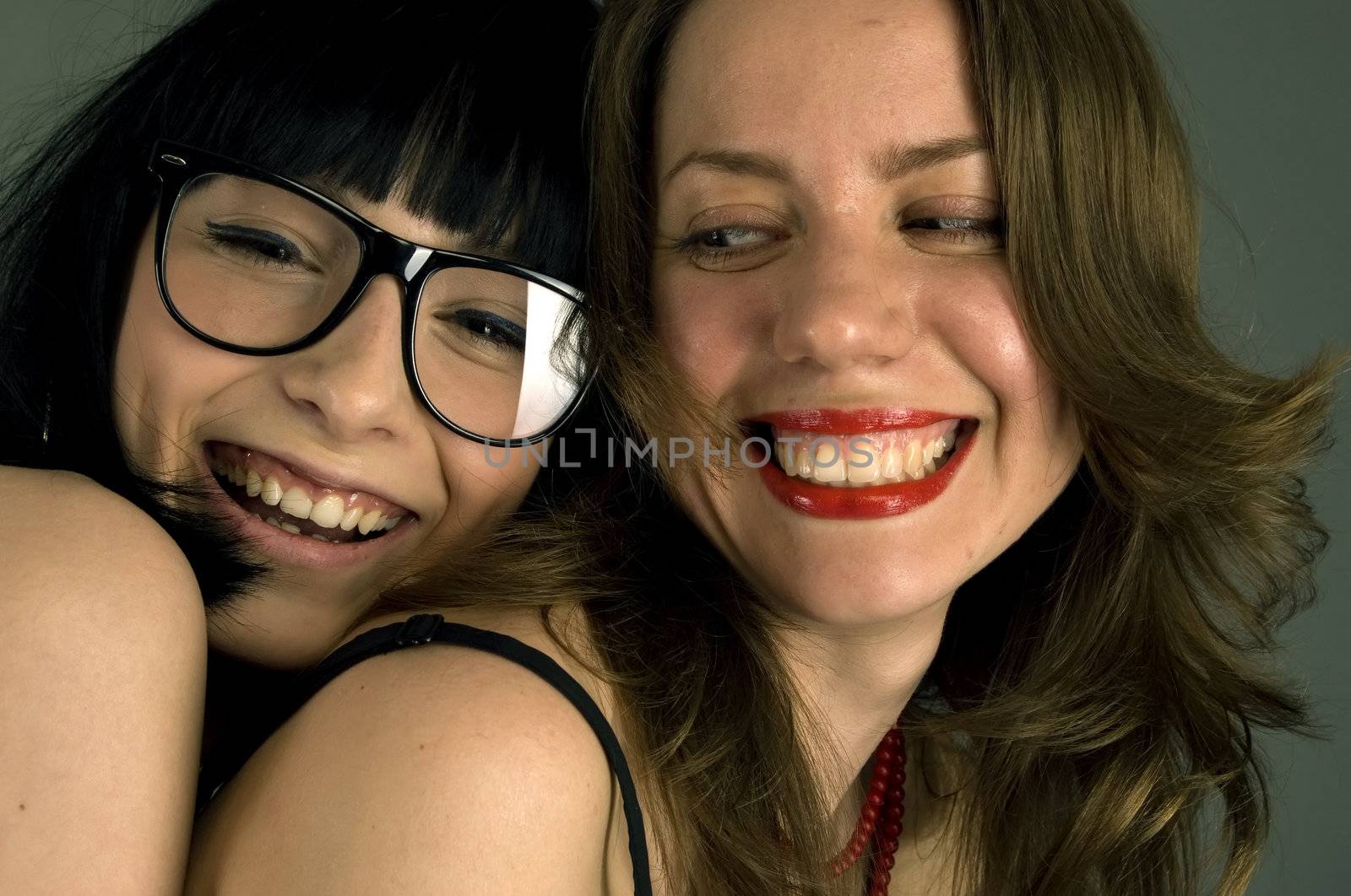 young happy girls - studio portrait