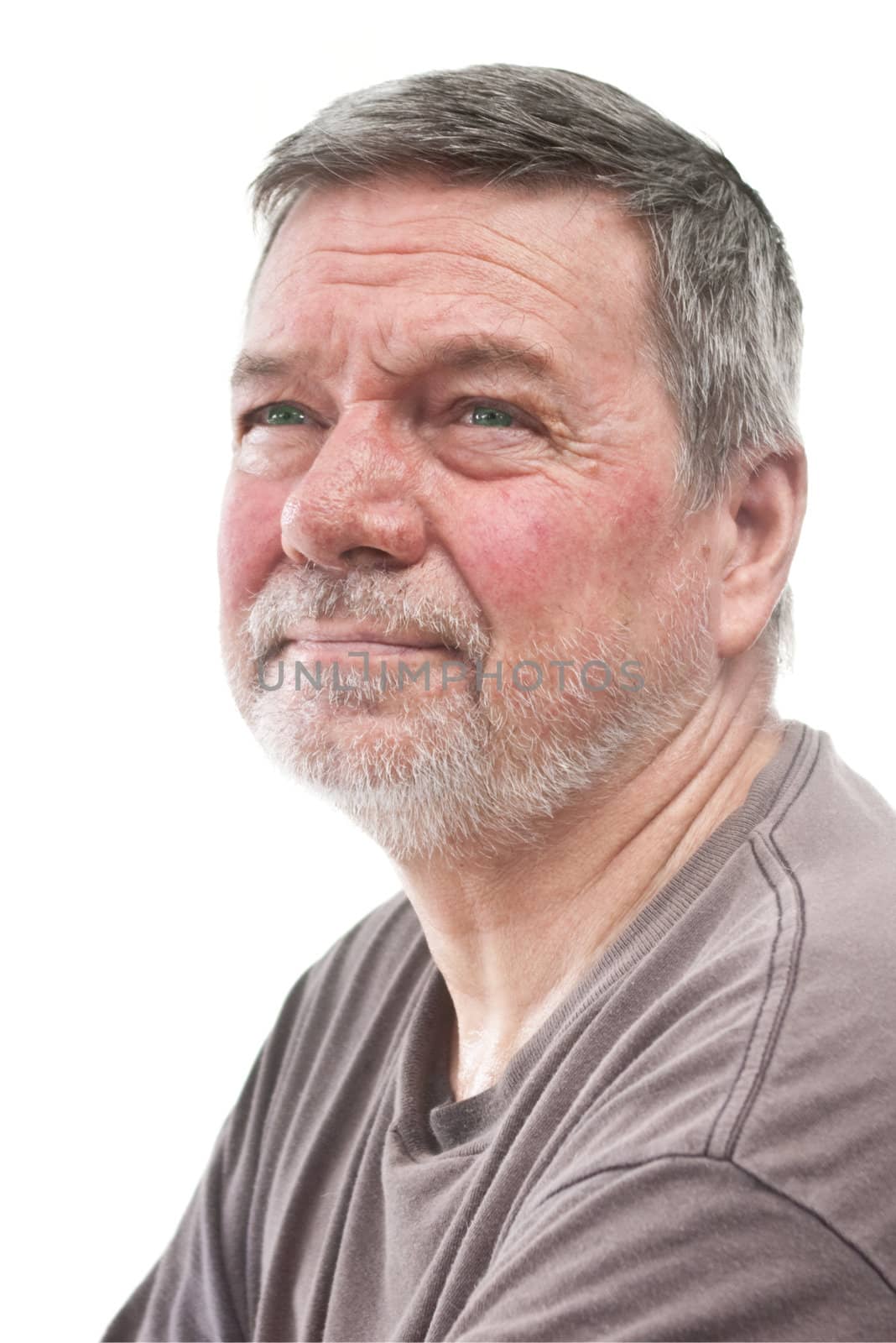 Mature man of 58 years, with white stubbly beard, 3/4 view, head & shoulders, isolated on white
