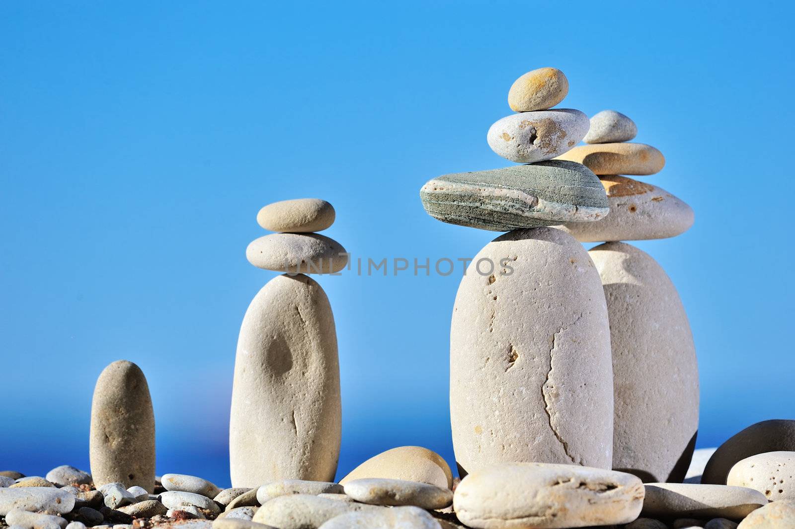White long pebbles on a background of blue sky