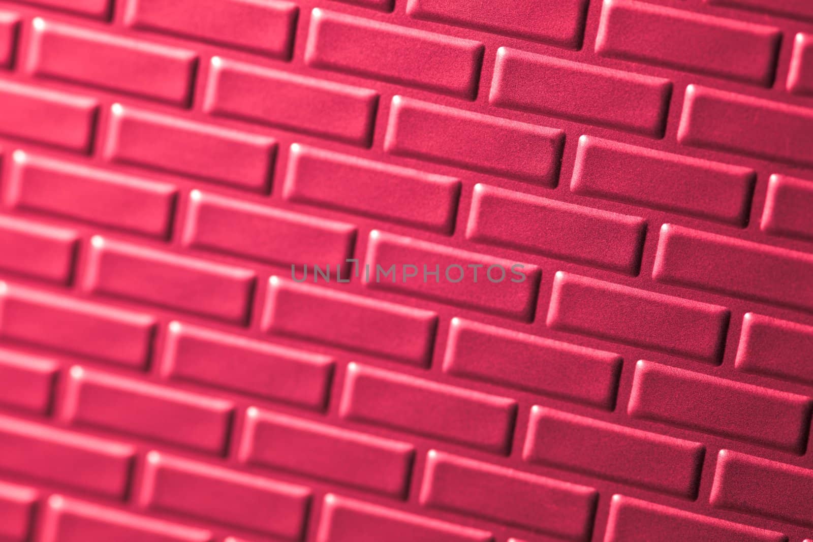 A wall formed by metal bricks