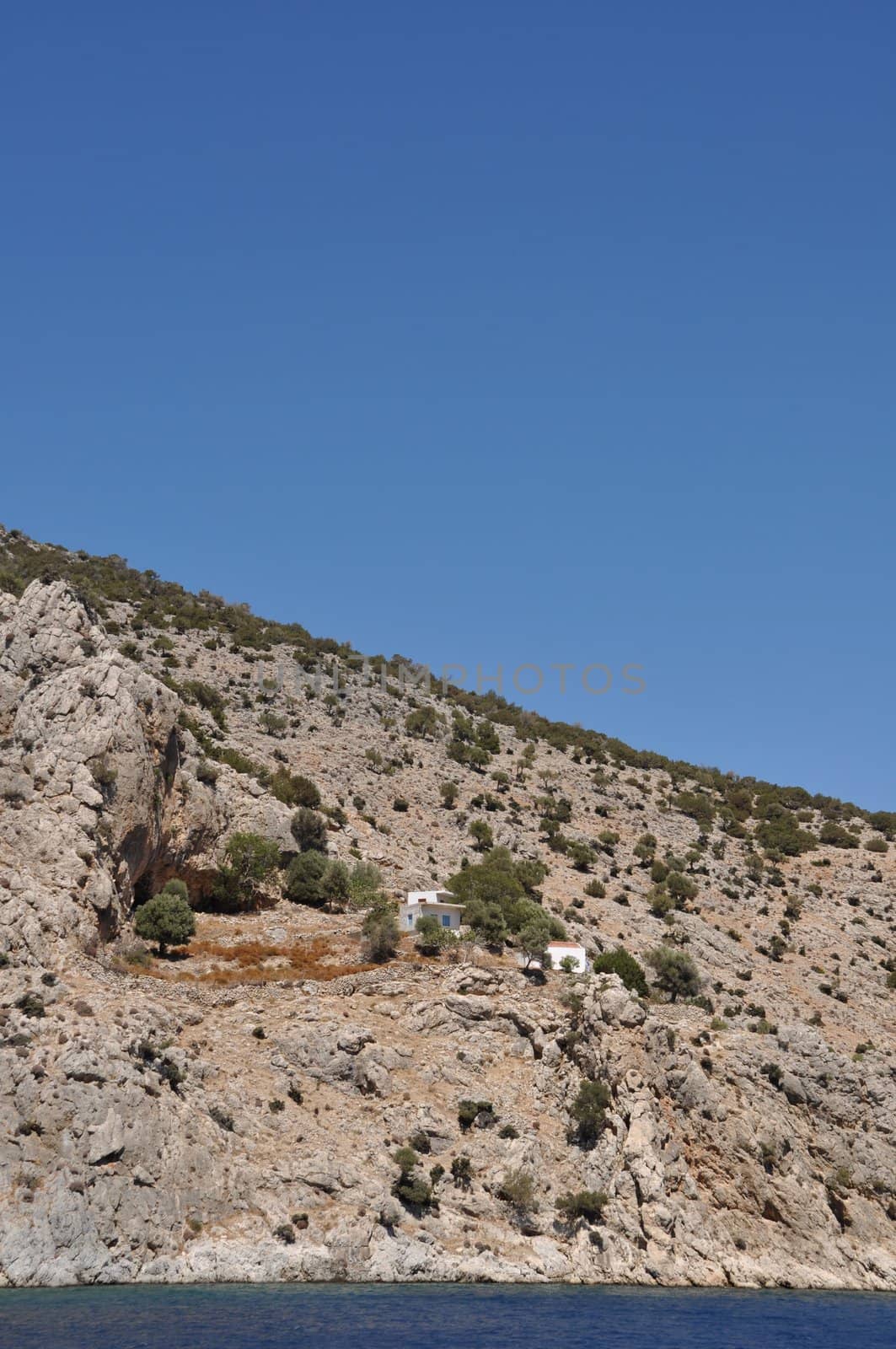 traditional houses in Kalymnos island, Greece (blue sky)