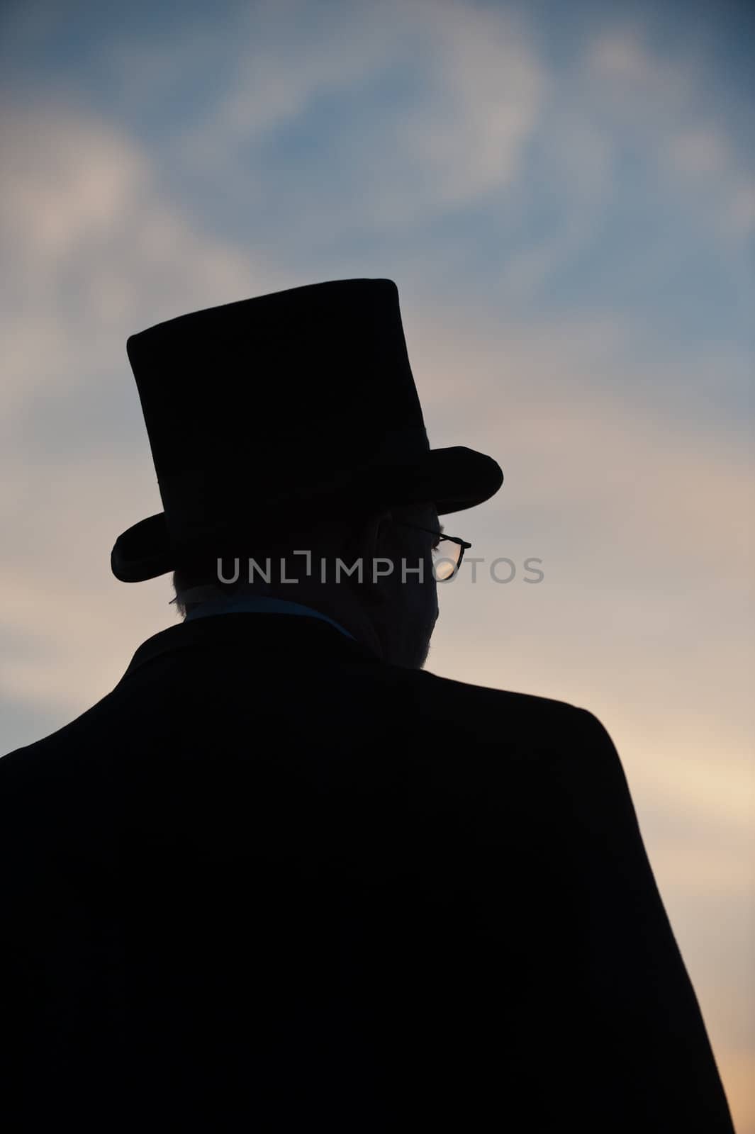 silhouette of man in top hat