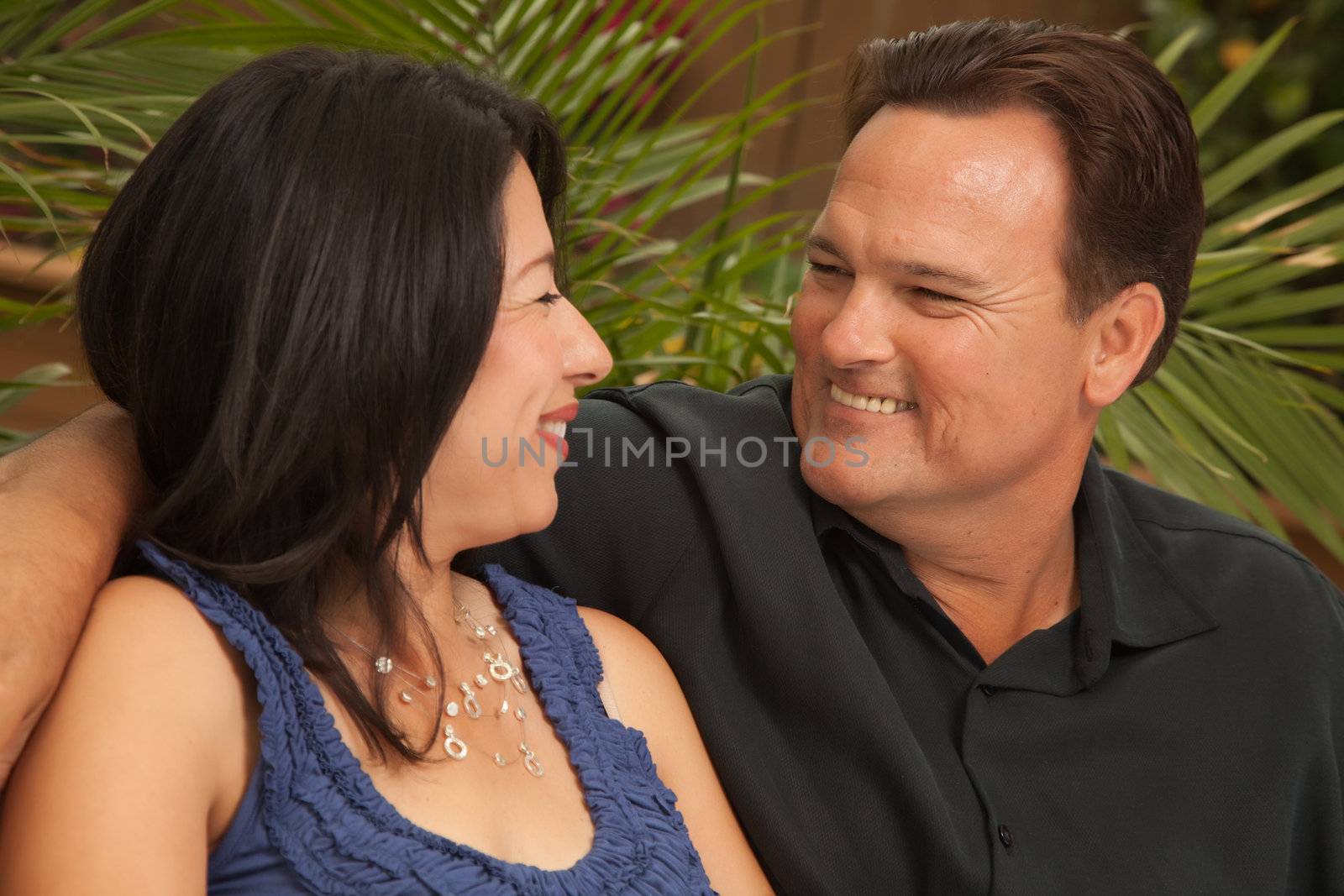 Attractive Hispanic and Caucasian Couple by Feverpitched