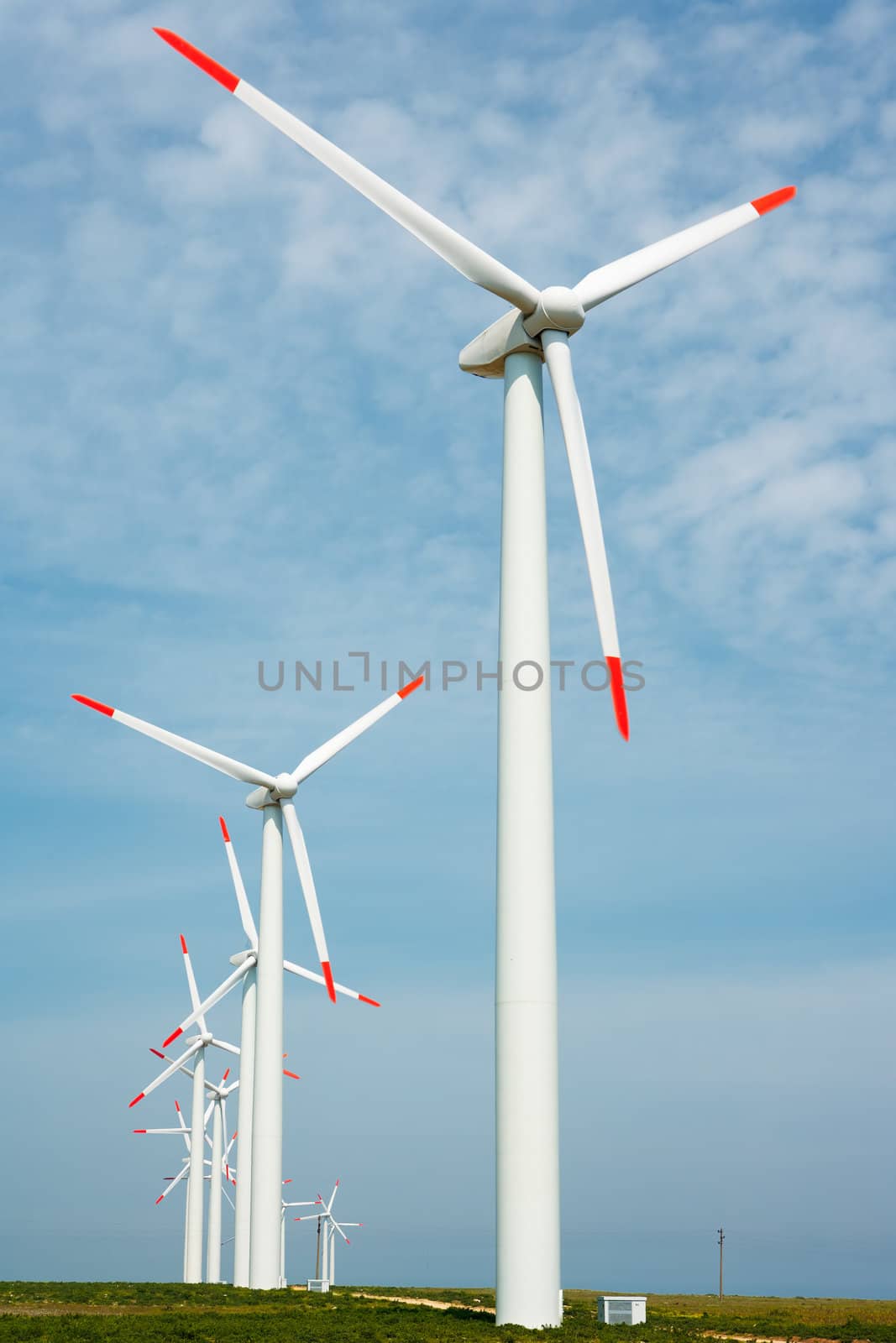 Nature conservation wind power generators, large turbines in a green field