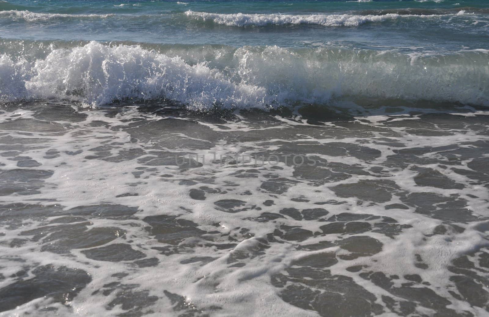 bright ocean water wave as a background or texture