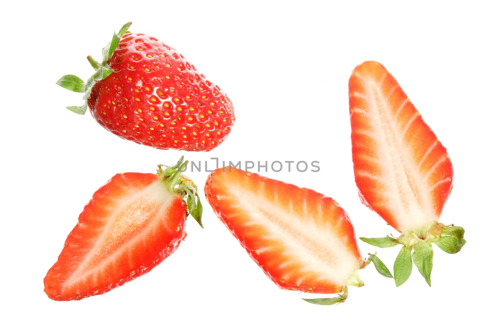 Strawberry in slices isolated on white