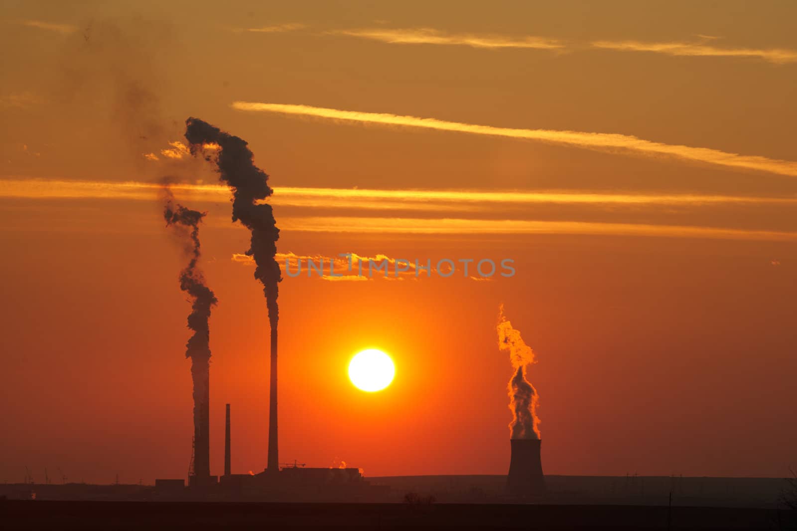 Smoke emissions at sunset by ecobo
