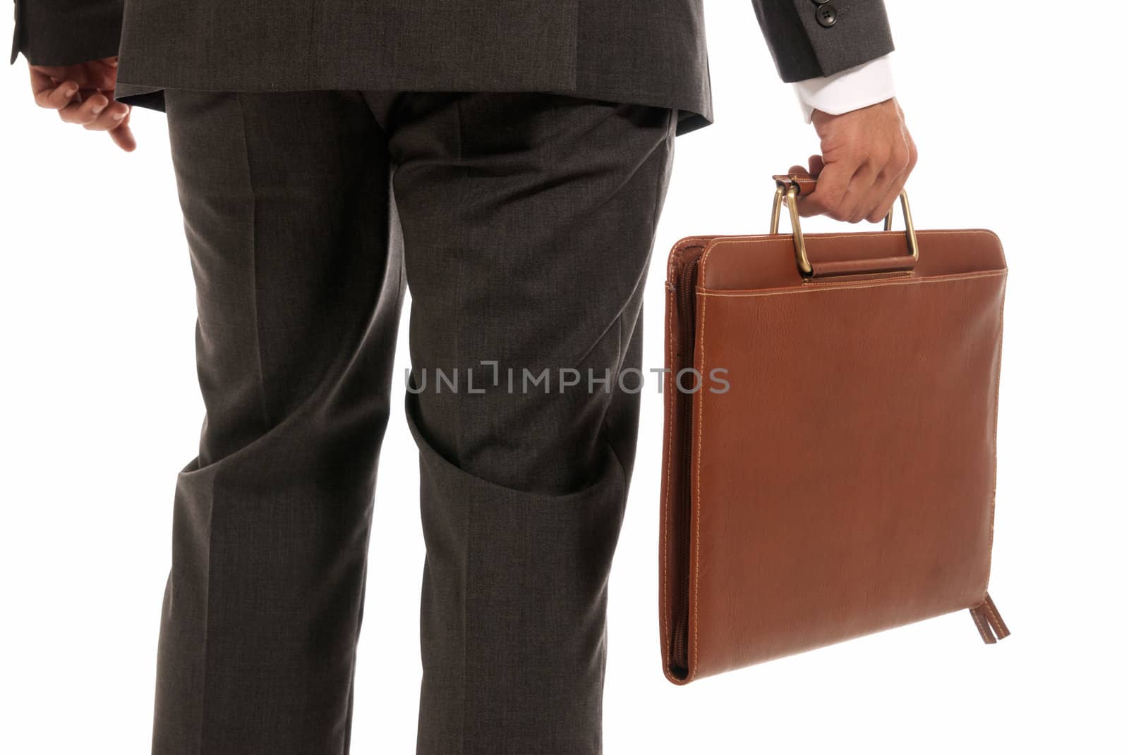 Unrecognizable businessman back with suitcase isolated on white background by dgmata