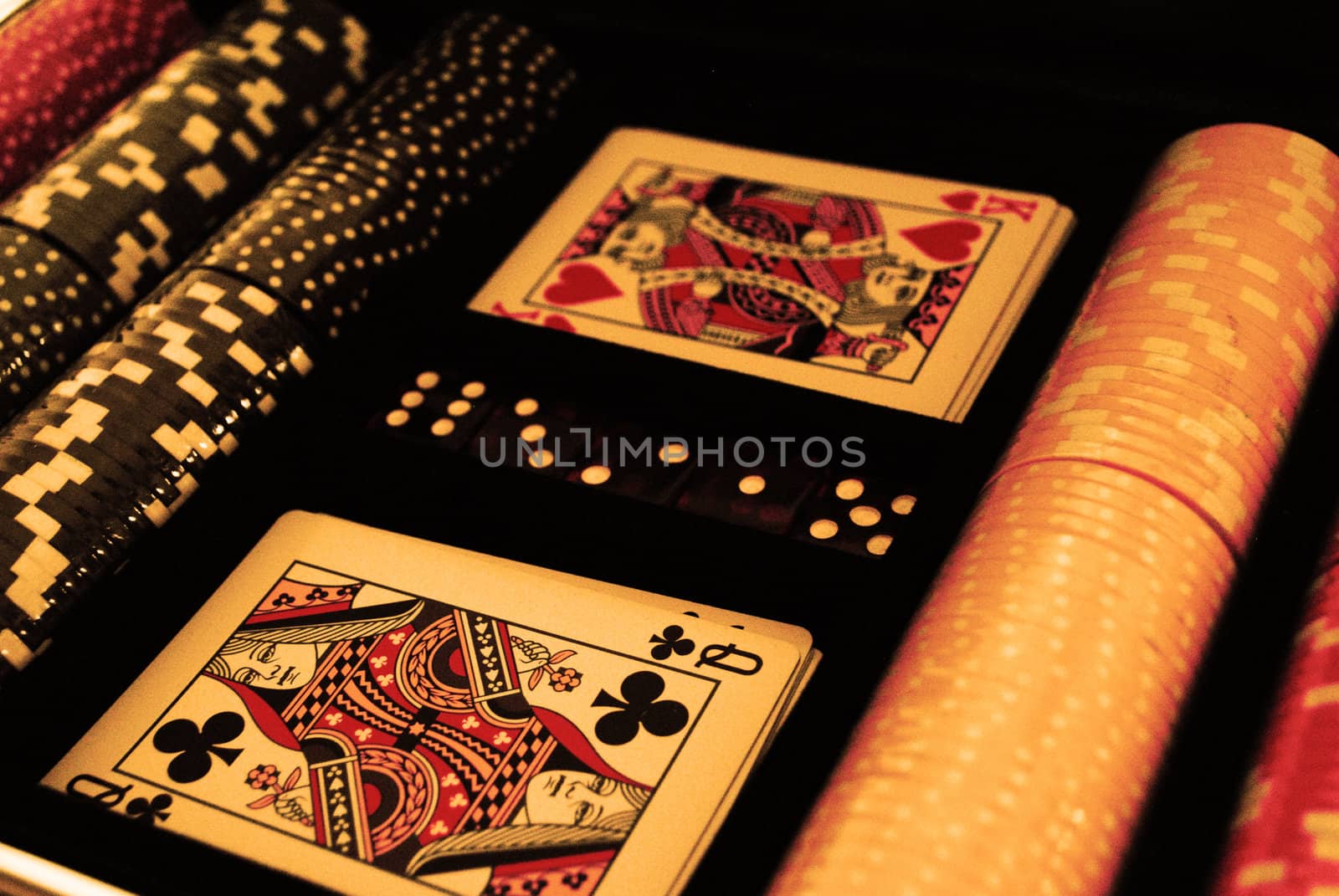 Playing cards, poker chips and dices.
