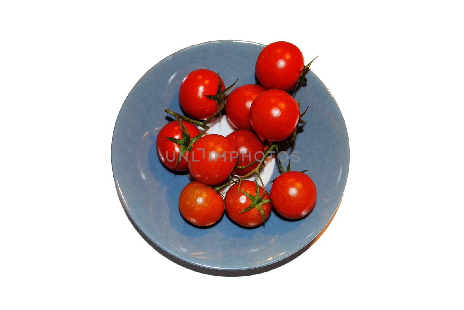 A plate of red tomatos.