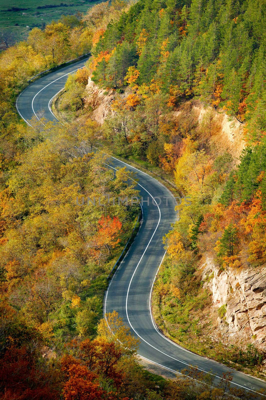 Autumn mountain view over a road