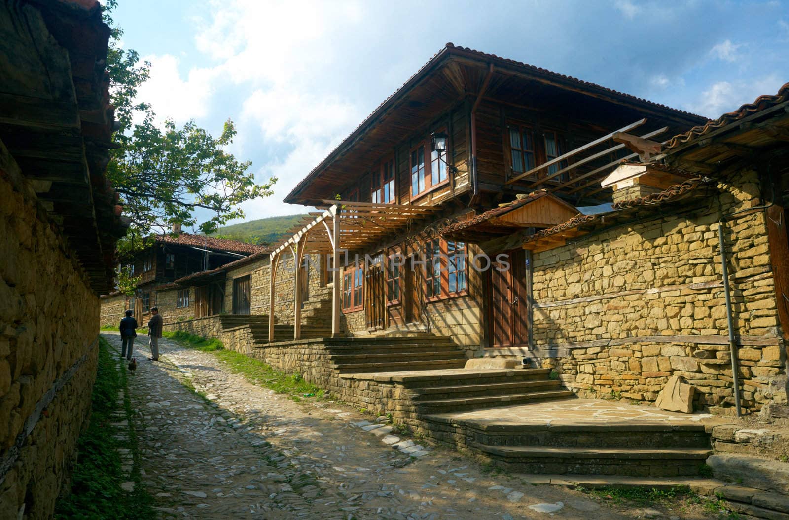 Street in Jeravna with wooden house