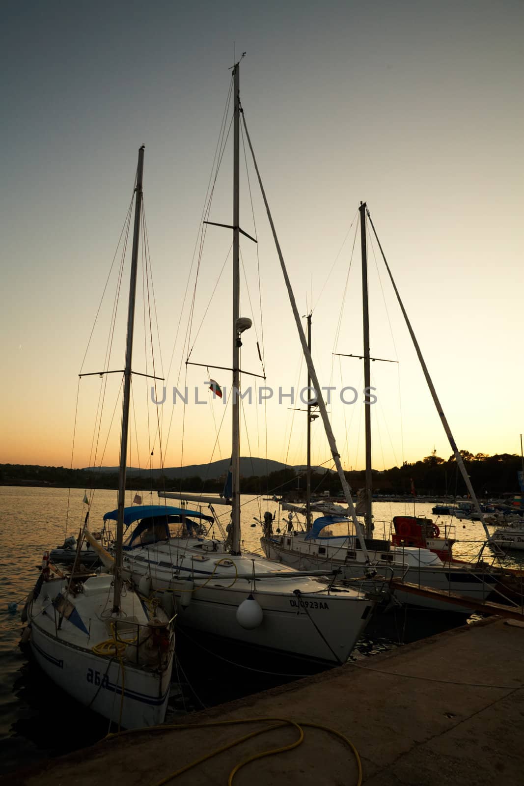 Yachts at sunset at the port of Tsraevo, Bulgaria