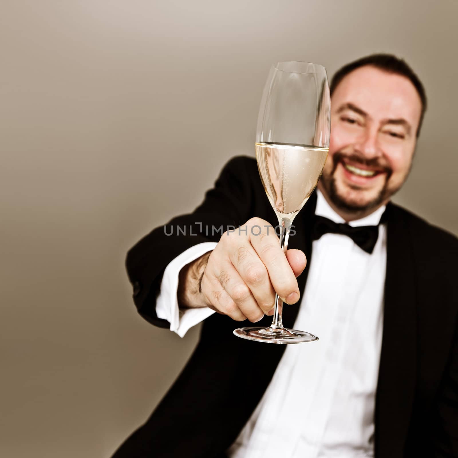 An image of a man with a glass