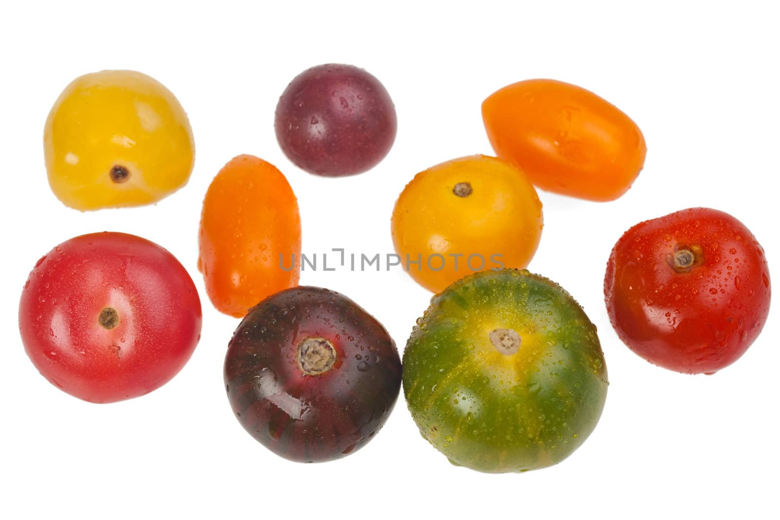 different tomatoes isolated on white background