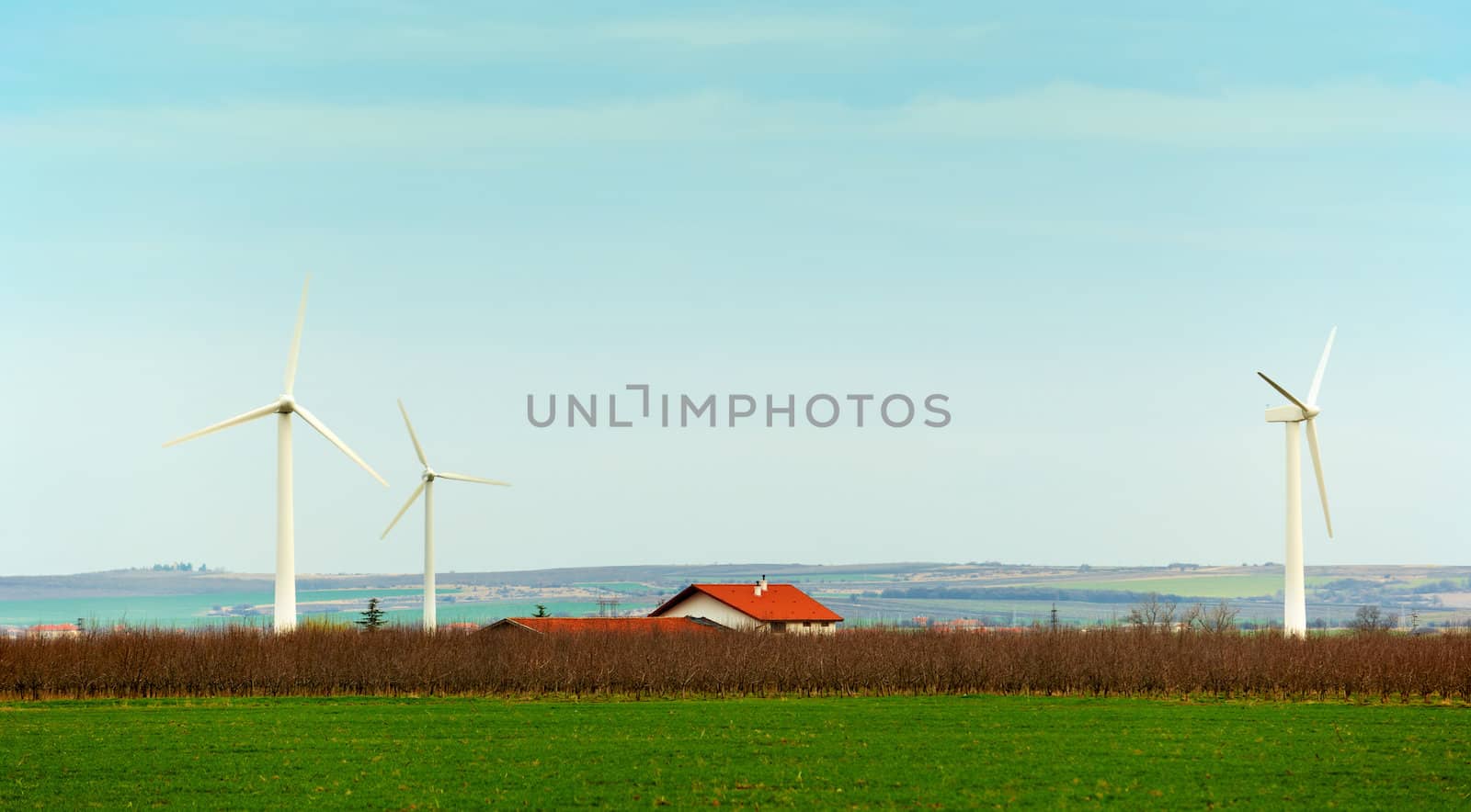 Electricity windmills around a country house