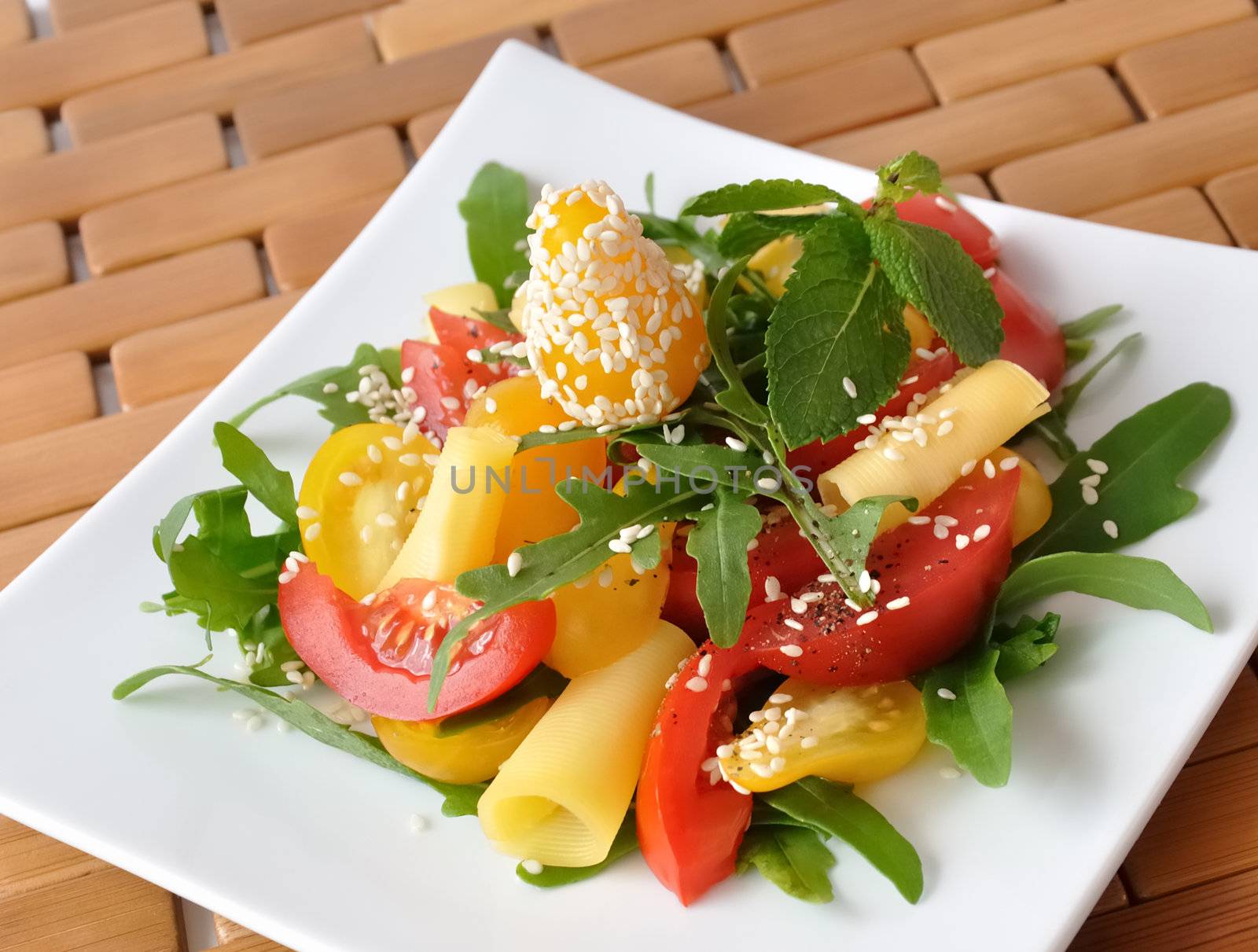 salad of red and yellow tomatoes by Apolonia