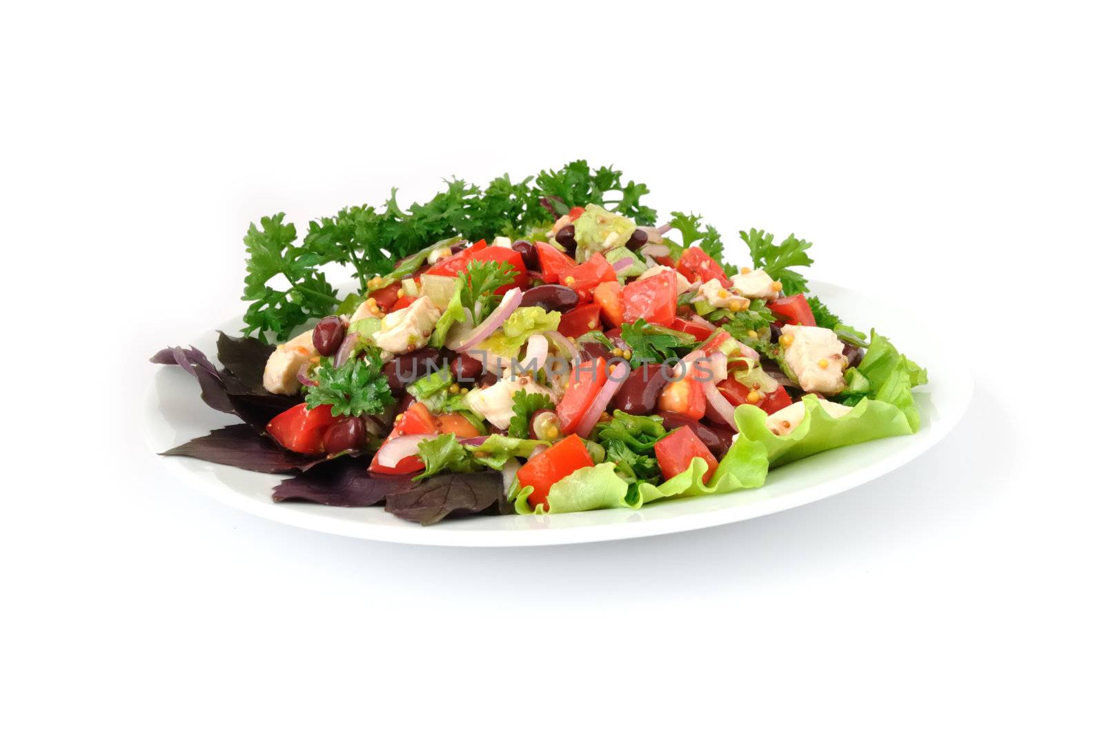 Salad with beans, tomatoes and chicken breast, lettuce, onions in mustard sauce with garlic