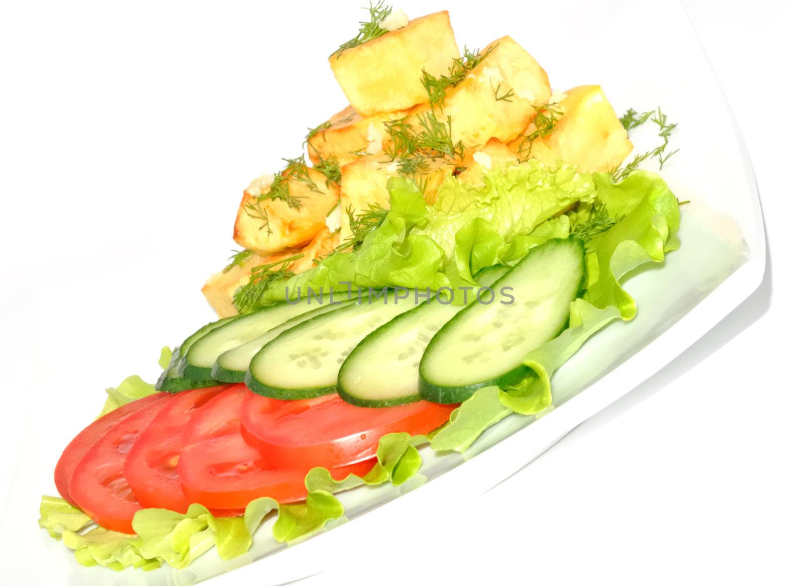 Potato country style with dill and garlic, fresh vegetables on white background