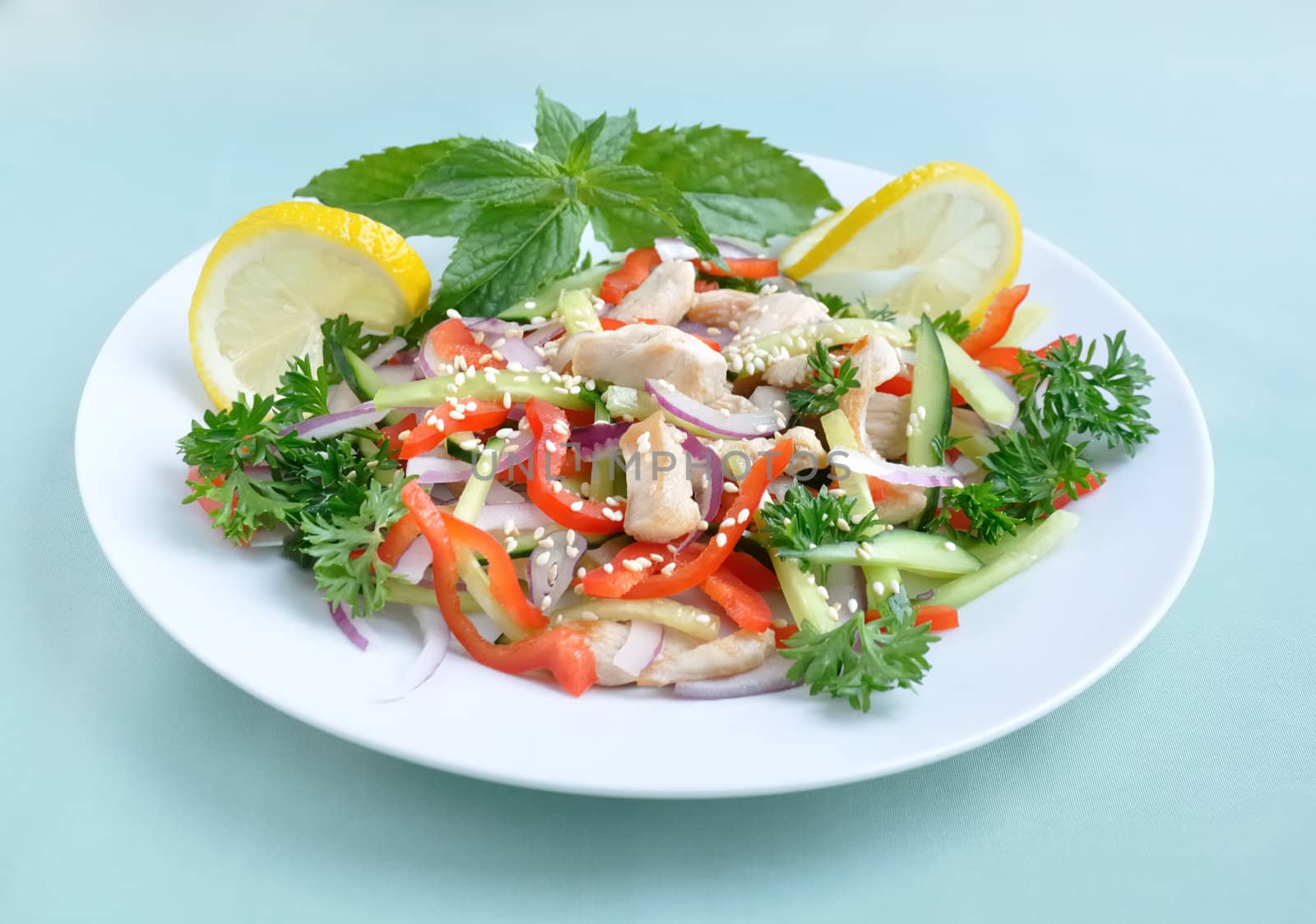 fresh vegetable salad with chicken and sesame