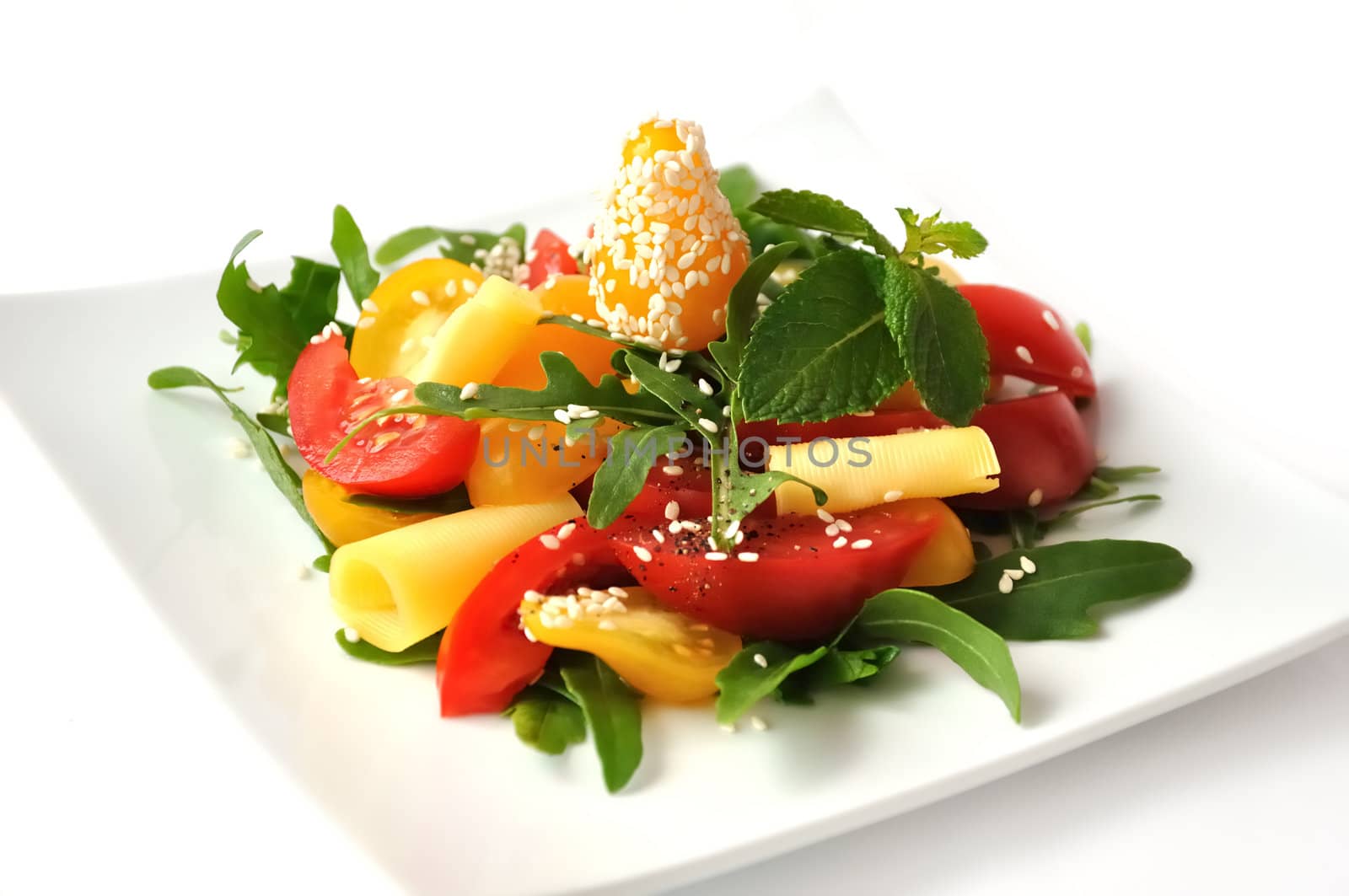 salad of red and yellow tomatoes by Apolonia