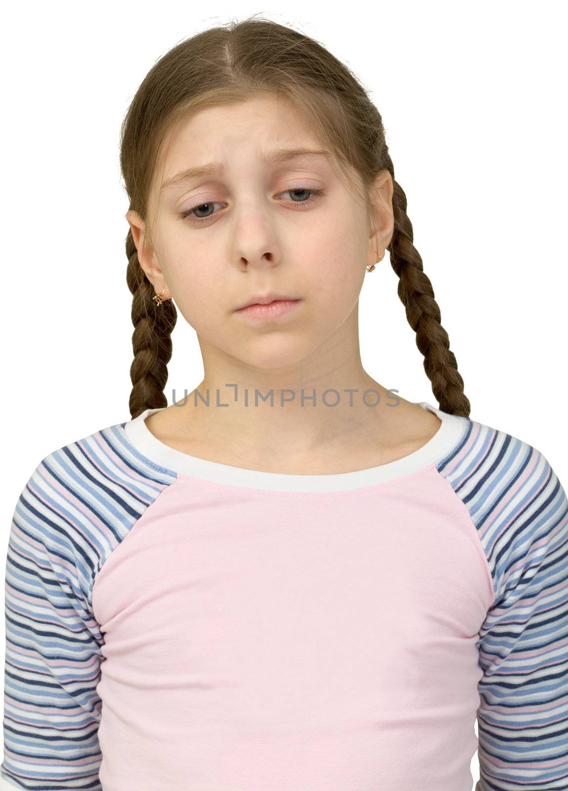 Very sad teenager girl on the white background