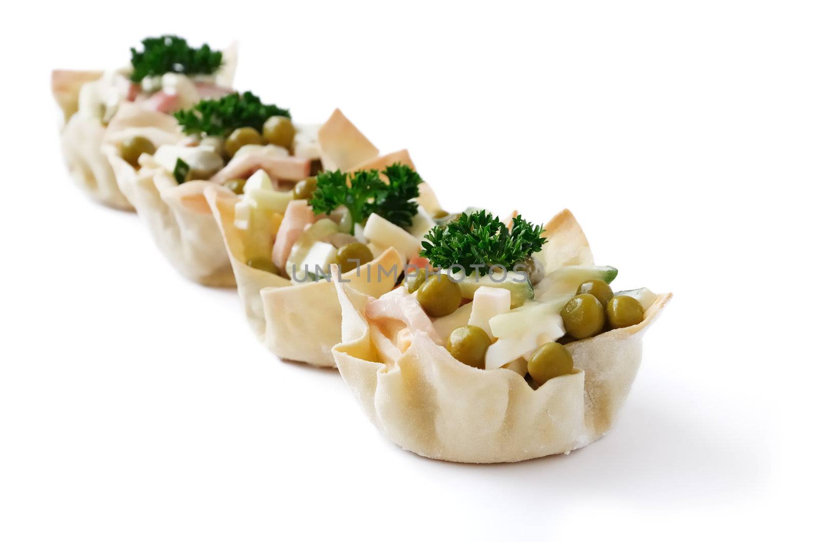 Cucumber salad, eggs, ham, peas, mayonnaise into tartlet (basket)