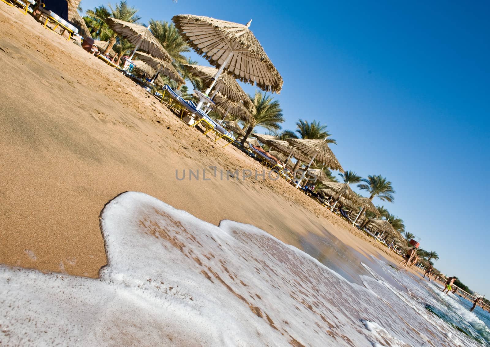 A wave coming to a sea shore in a wonderful resort