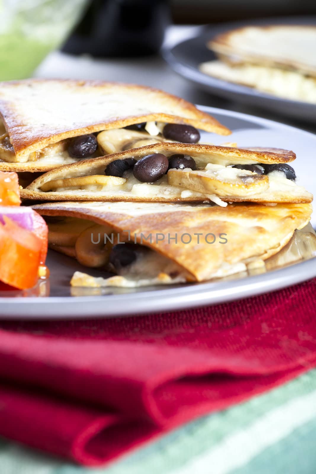 Black bean, mushroom and cheese quesadillas.