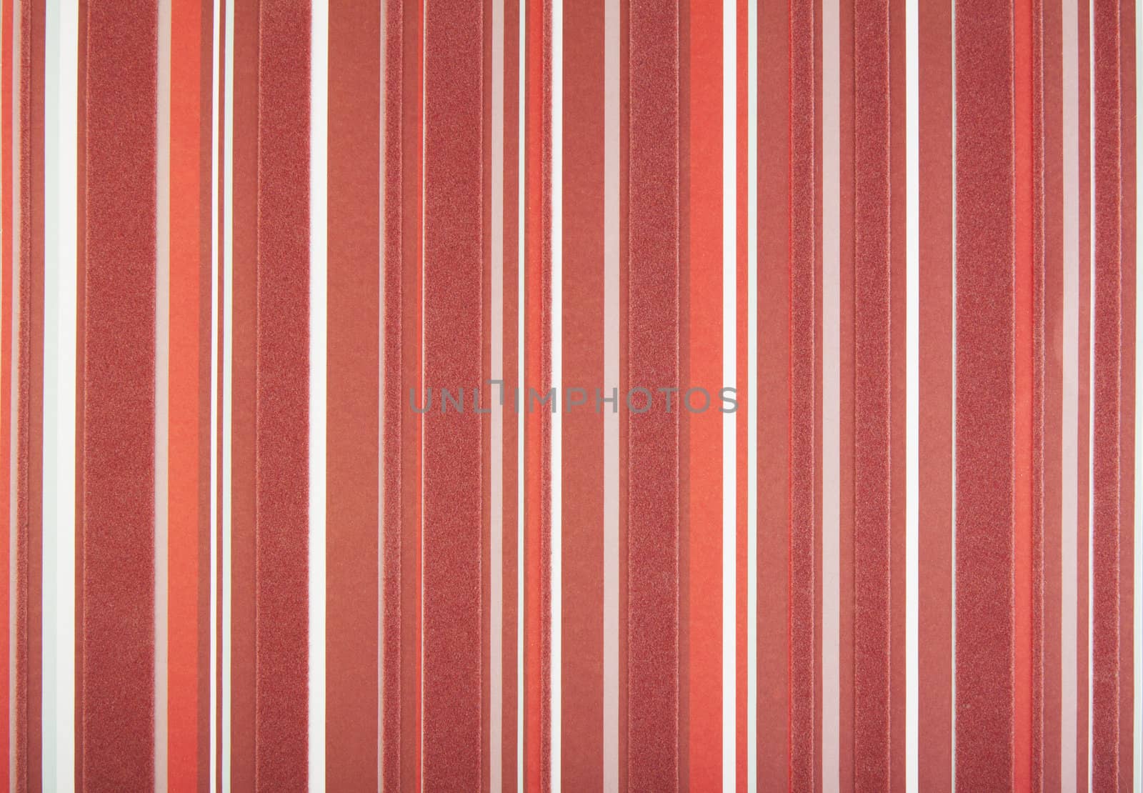 Red and white textured striped background pattern.