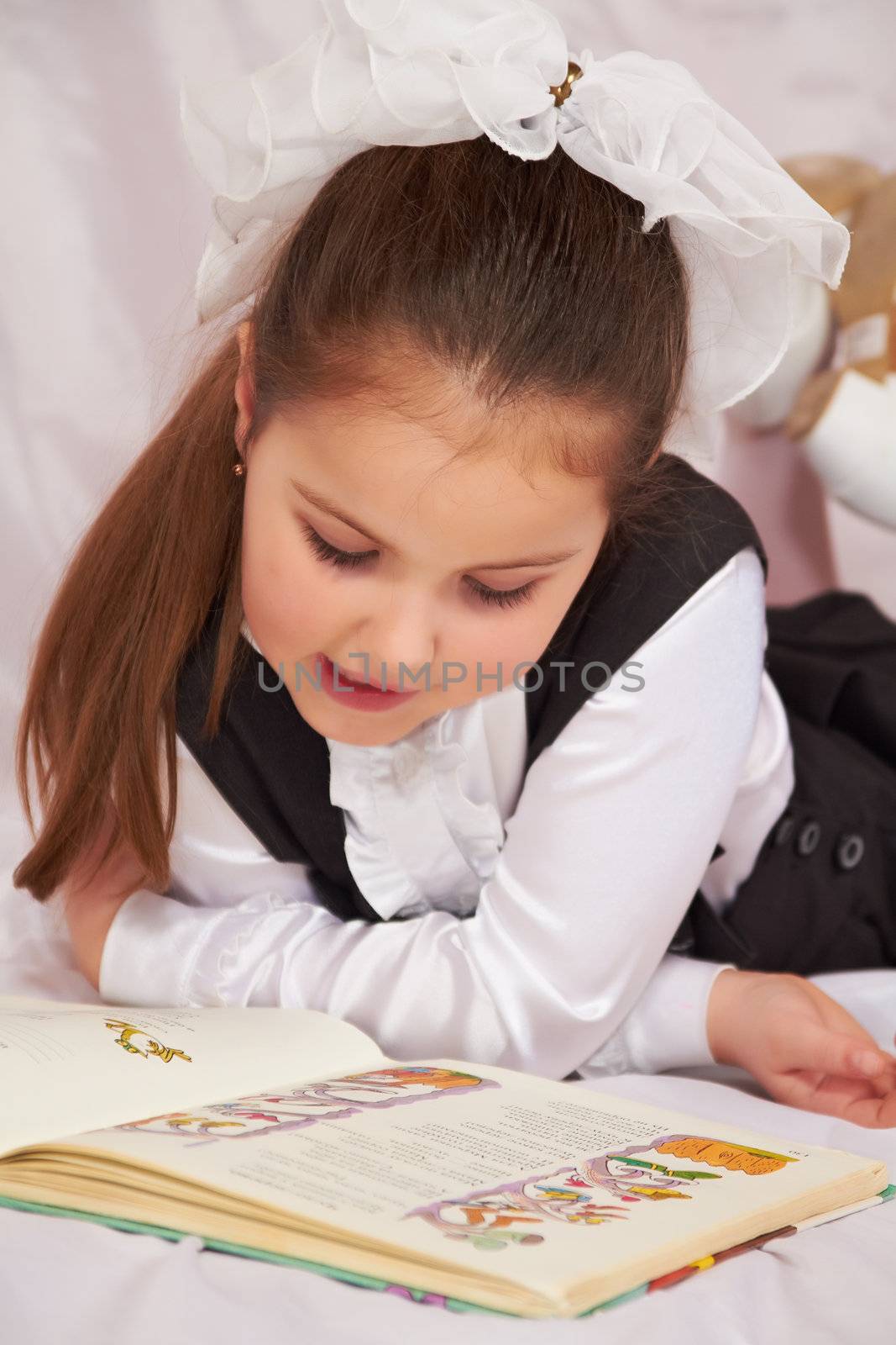 A child reading a book.