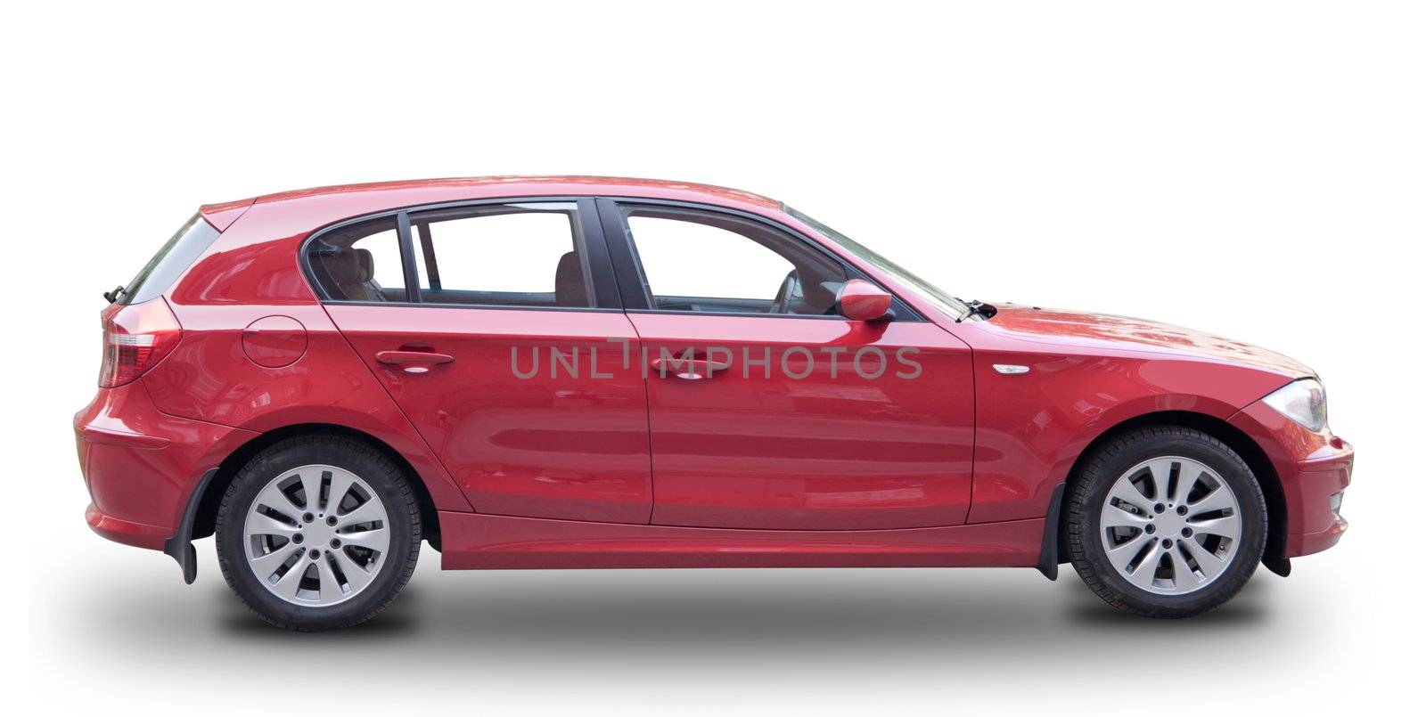Modern hatchback isolated over white background, light shade