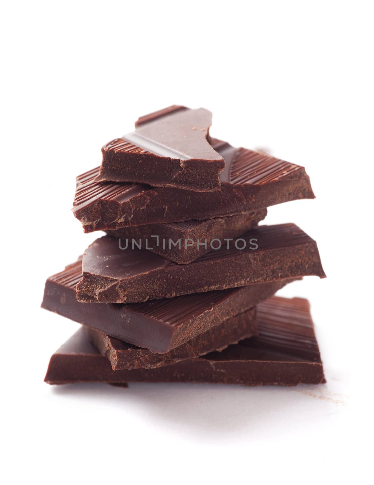 Blocks of chocolate on white background